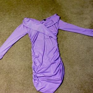 This is a light purple sparkle dress tight. tight fitted shoulders revealing